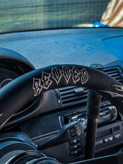 "ENJOY THE RIDE" STEERING WHEEL