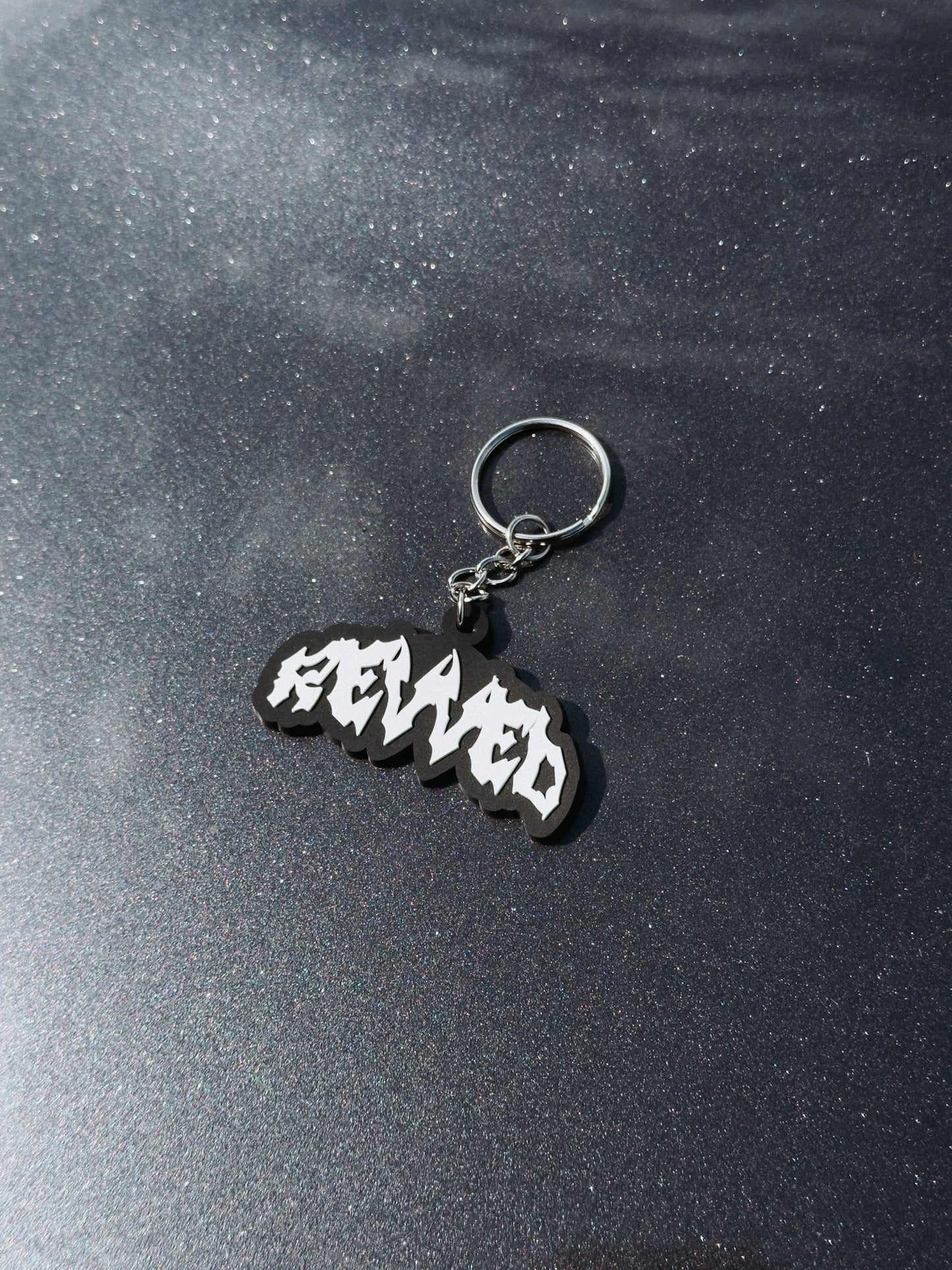 REVVED LOGO SILICONE KEYCHAIN